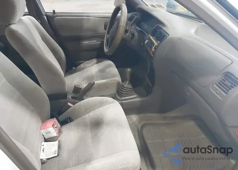 1997 Toyota Corolla Dx z USA, uszkodzony, nr VIN 2T1BB02E3VC181698